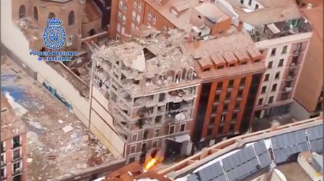 Scale of disaster site after fatal Madrid explosion revealed in aerial footage filmed by Spanish police (VIDEO)