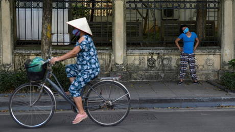 Hanoi imposes movement curbs, halts travel to 14 Vietnamese provinces amid Covid-19 surge