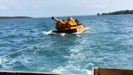 Mysterious floating tank reclaimed from sea (VIDEO)